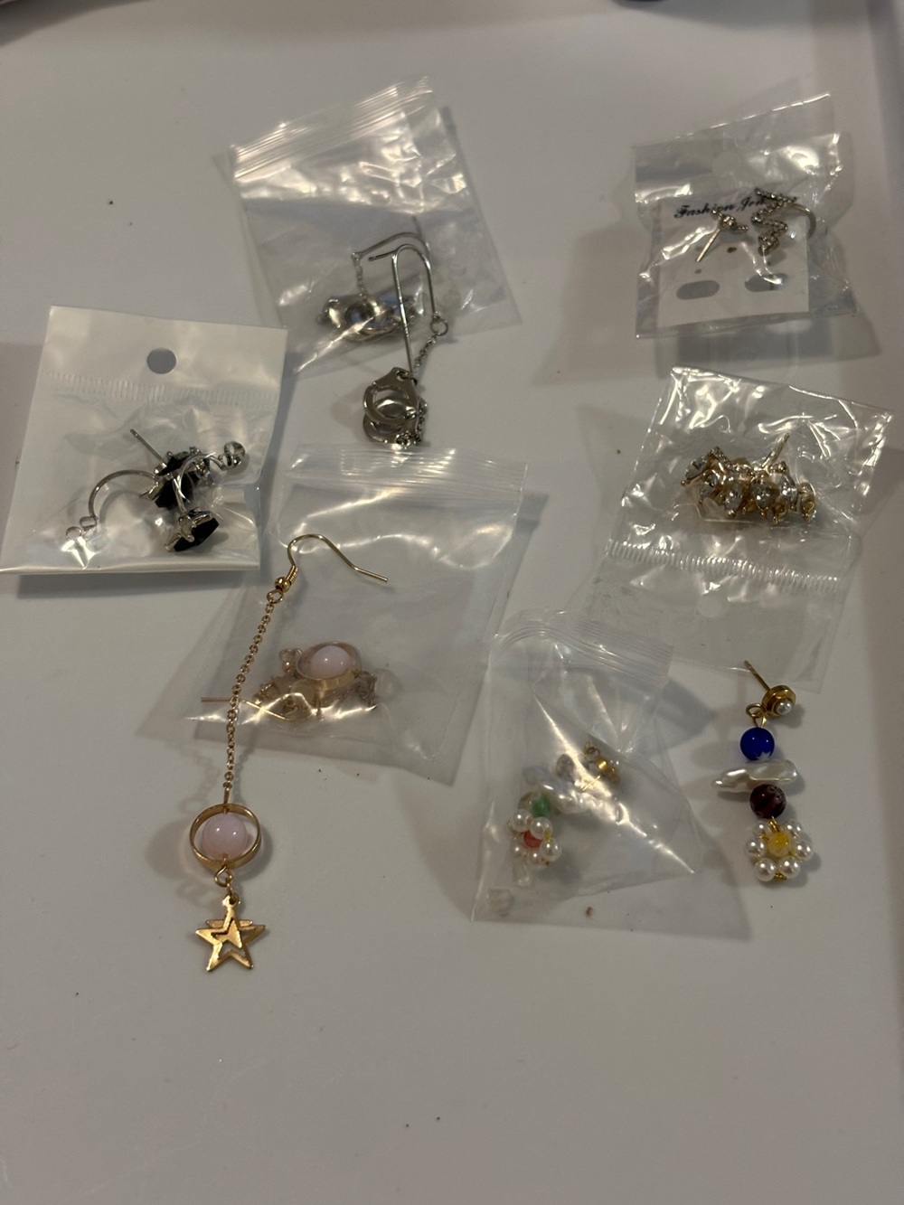 Gold Star Drop Earring with Pink Accent and more.